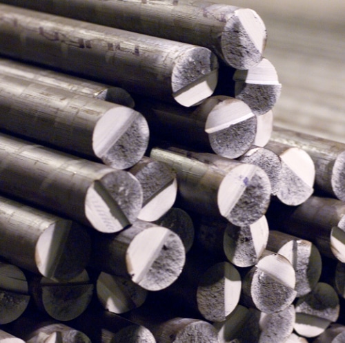 A group of Ni-Resist Iron rods laid in a pile